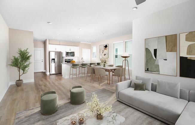 An open, light-filled layout at Amavi Kissimmee offers generous space to gather, with a seamless flow from kitchen to living area and views of your private yard.
