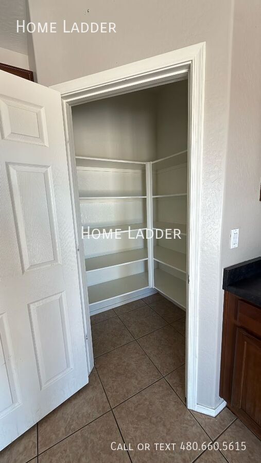 4703 S 99 DR