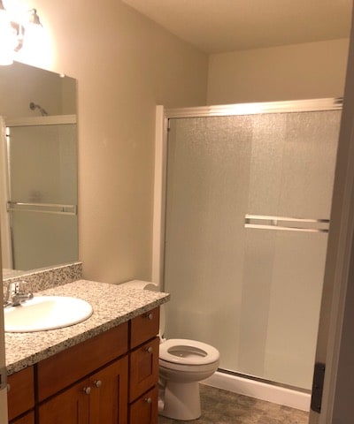 a bathroom with a toilet and a sink