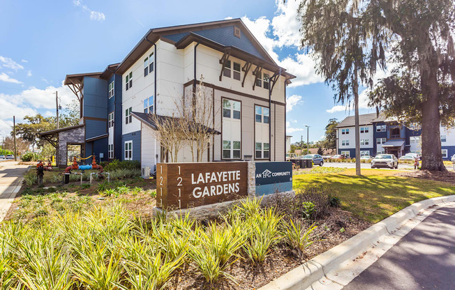 a large building with a sign that says lafayette gardens