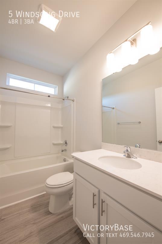 5 WINDSONG DR