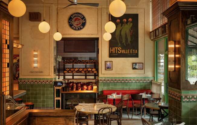 the interior of a restaurant with tables and chairsat Book Tower, Detroit, Michigan