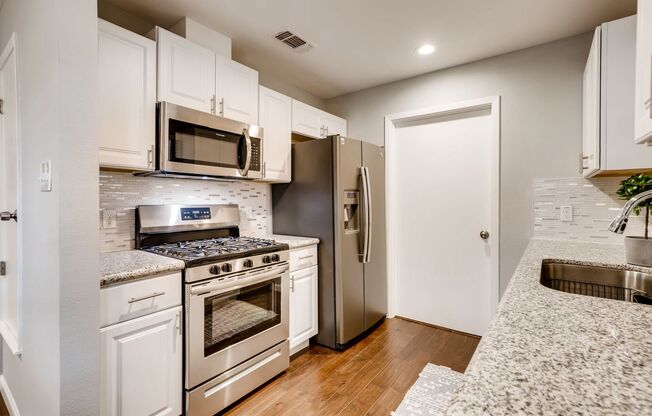 RECENTLY REMODELED 3 BR / 2 BATH COTTAGE LOCATED STEPS FROM THE PRESTIGIOUS OLMOS PARK