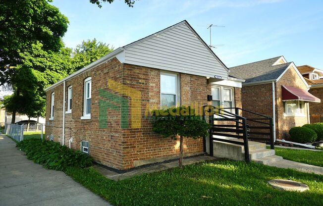 Updated 4-Bedroom Home with Finished Basement and Fenced Yard