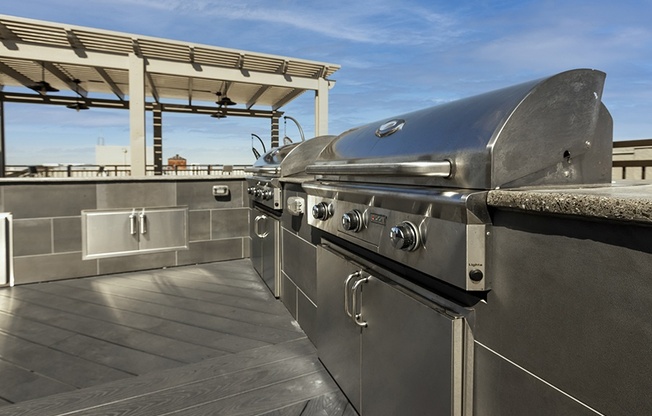 Rooftop BBQ area with seating