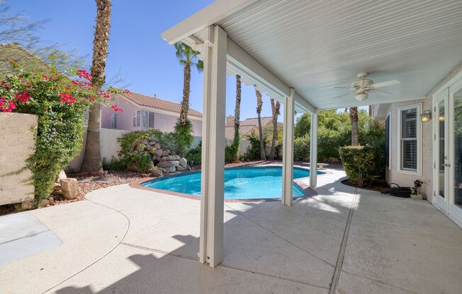 2 Story Summerlin Home with Refreshing Pool & Lush Landscaping