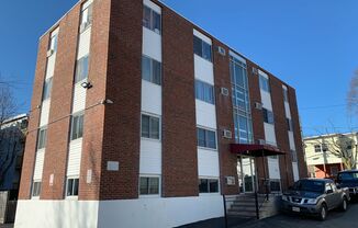 Heat and hot water included! Bright and clean 2 bed 1 bath 1st floor condo in a well managed building
