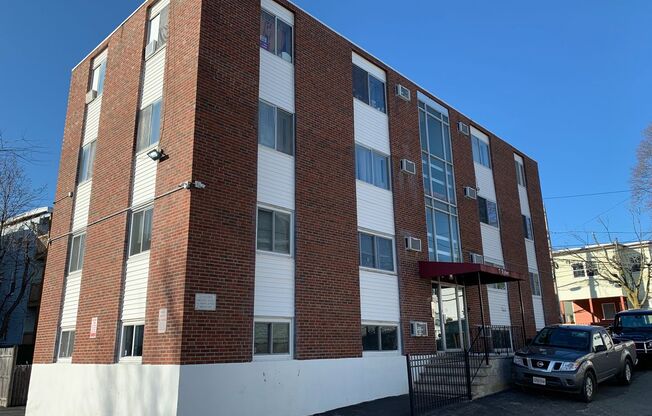 Heat and hot water included! Bright and clean 2 bed 1 bath 1st floor condo in a well managed building