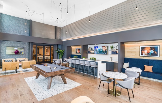 Experience the ultimate leisure space at Modera Montville! Our clubroom boasts a poker table, pool table, and TVs, offering endless entertainment and a great place to relax with friends.