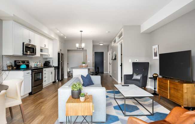 a living room with a couch and a table