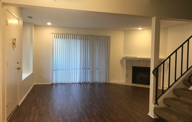 Rare 2-Story End Unit with 2 Patios and a Balcony