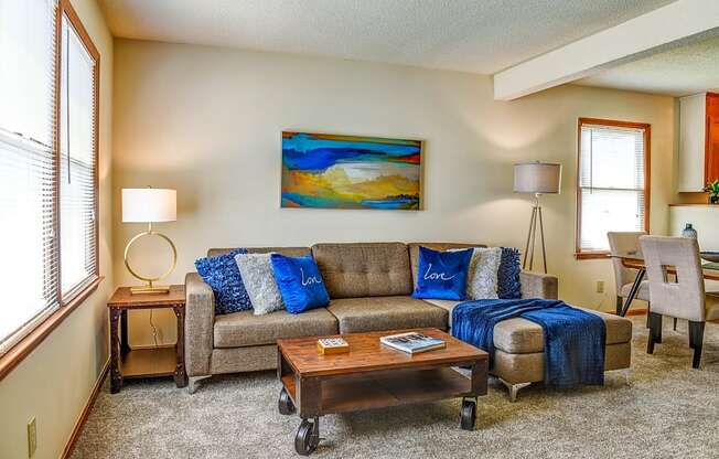 a living room with a couch and a coffee table