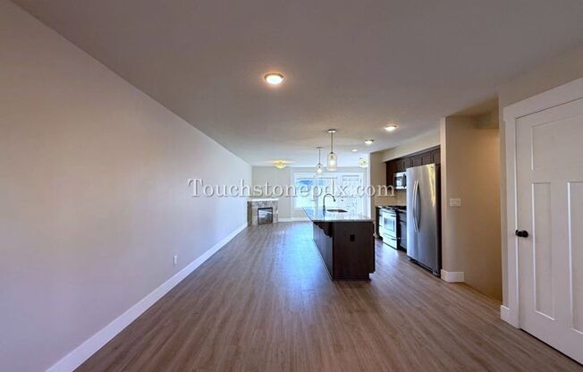 Modern Open Concept 3 Bedroom Home with Balcony and Attached Garage