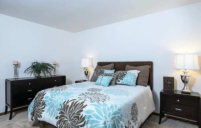 bedroom with a bed and two night stands