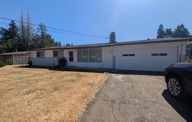 Rambler with large yard and storage shed...