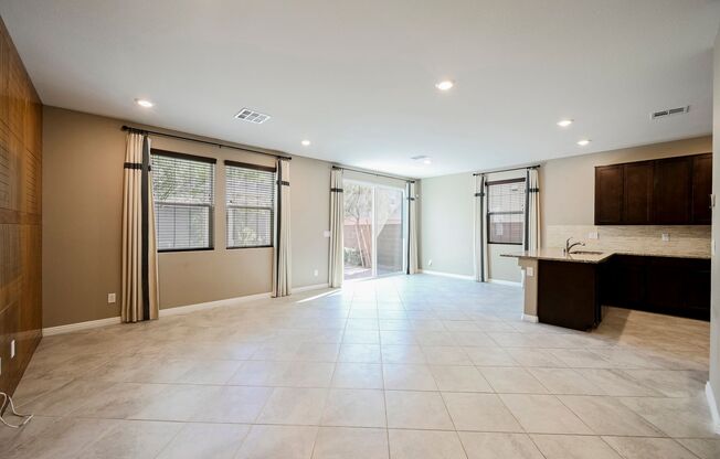 Look No Further! Lovely 3 Bedroom And 2.5 Bathroom Is Located In The Beautiful Tule Springs Master Planned Community.