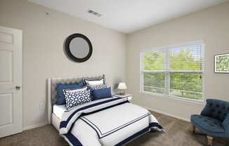 Beautiful Bright Bedroom With Wide Windows at Villas at Carrington Square in Overland Park, KS