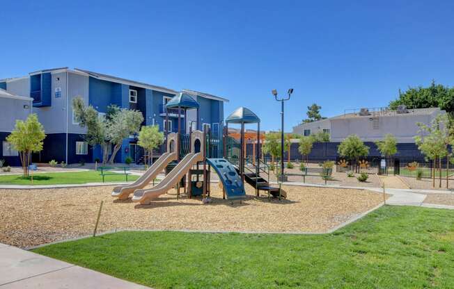 playground at the flats at big tex apartments