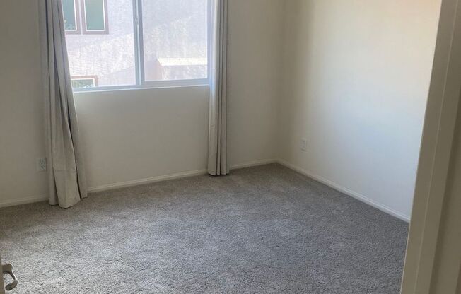 brand-new with two car garages, four bedrooms plus a loft, and two and a half bathrooms.