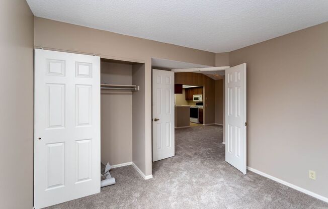 Cozy 2-Bed Condo with Fireplace, Garage & Pool Access Near Shopping!
