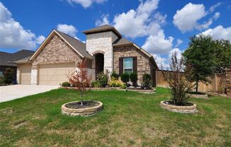 One story corner lot home with a 3-car garage in sought after neighborhood The Avalon