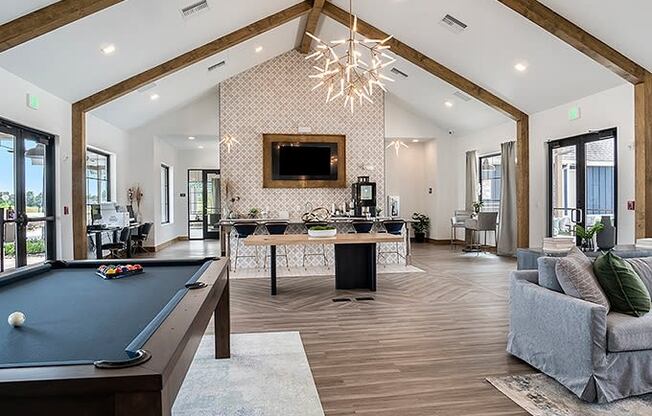 Clubhouse Kitchen & Lounge Featuring A Pool Table