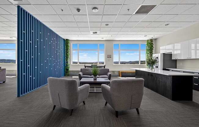 A modern office with a view of the mountains.