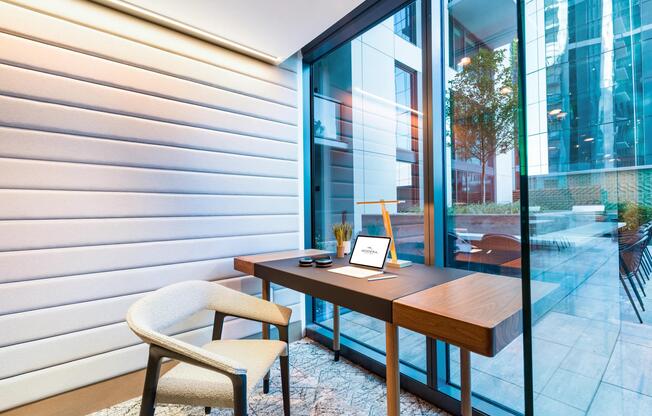 A quiet work nook at Modera McGavock, offering natural light and a focused setting with Nashville’s energy just beyond the doors.