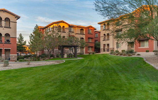 take a stroll through the manicured lawns at the enclave at woodbridge apartments in sugar