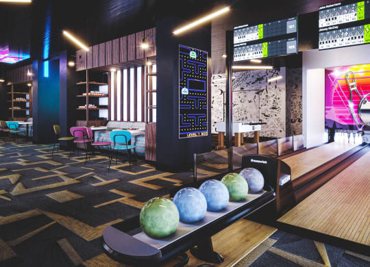 Arcade room with indoor bowling alley