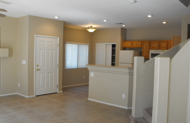 Spacious Henderson townhouse featuring   3 bedrooms PLUS 2 car garage.