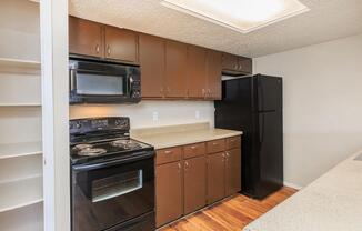 KITCHEN INCLUDES A PANTRY AND DISHWASHER