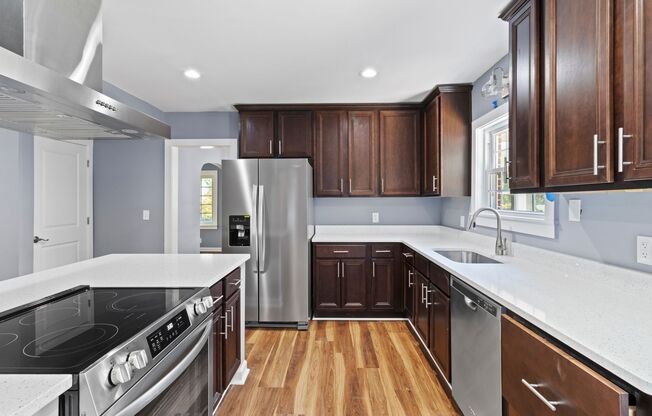 Newly Renovated, In-law Suite, Master on the main floor.