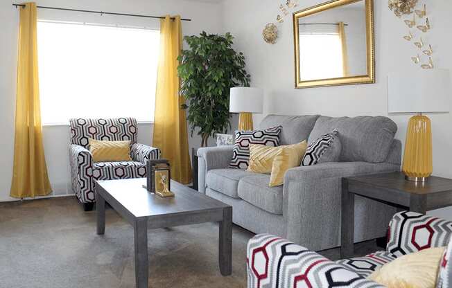 a living room with a couch and a coffee table