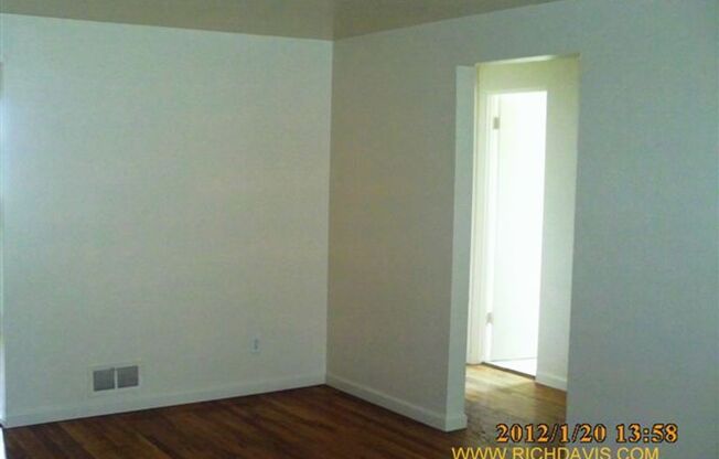 2 bed, 1 Bath, 900 SF with washer/dryer hookups and a large, fenced yard.