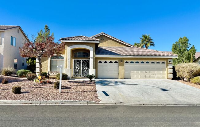 Gorgeous recently renovated single story 4 bedroom home on a large lot with a pool in the Southern Highlands community!