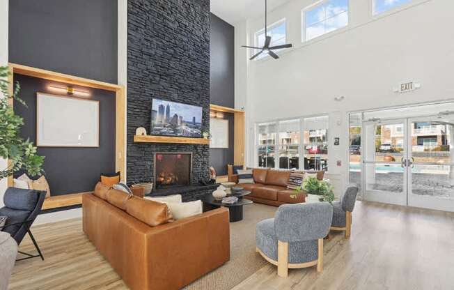 A modern living room with a fireplace and a chair.