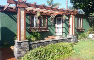 Tropical Oasis in West LA: Stunning 3-Bedroom Home with Lush Yard, Hot Tub & Koi Pond