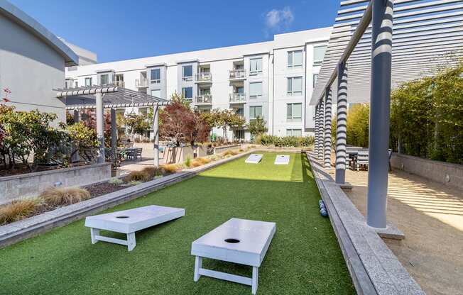 corn hole and grass area