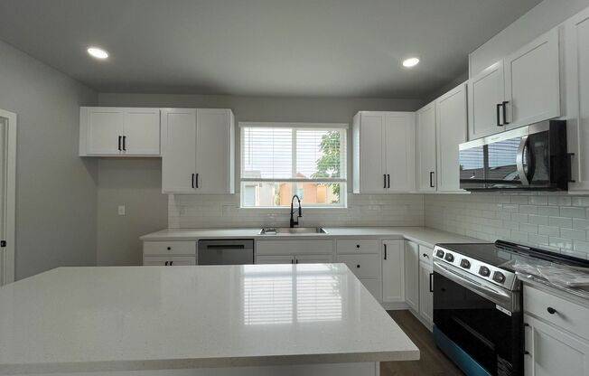 Luxury Living with Granite Counters & Stainless Steel Appliances