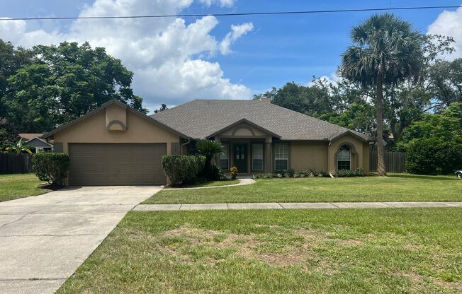 Large 4/2 with 2 Car Garage & Huge Fenced Backyard in the Heart of Lake Mary!