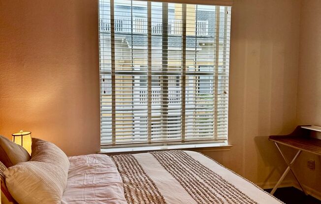 FULLY FURNISHED with King Bed-Pool View 1brm 1ba with inside full size laundry- Utilities included!