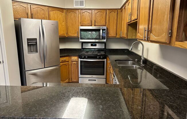 Stylishly Renovated 3BR/ 2BA Townhome with Garage & Private Yard