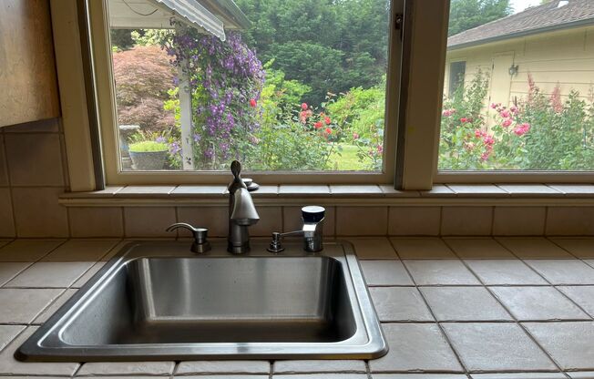 Timeless Character Meets Spacious Living in This Unique 4-Bedroom Vintage Home with A/C