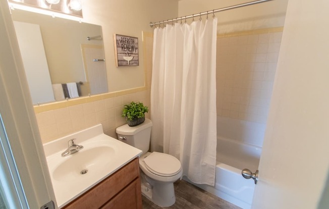 This is a photo of the bathroom in the 705 square foot 2 bedroom, 1 bath apartment at Lisa Ridge Apartments in the Westwood neighborhood of Cincinnati, Ohio.