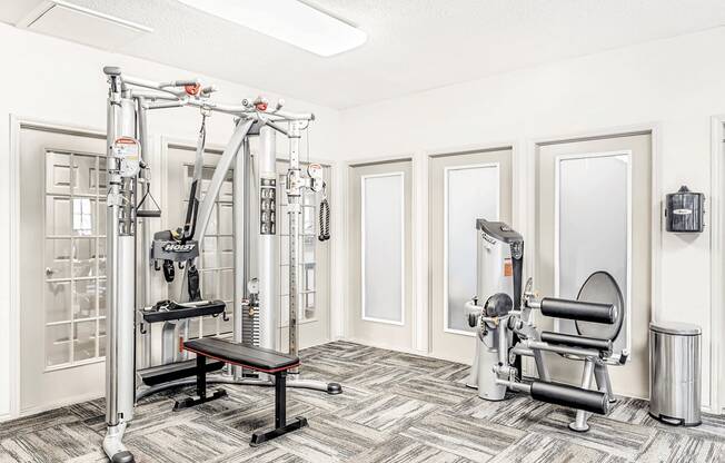 Fitness center with strength machines and frosted glass windows