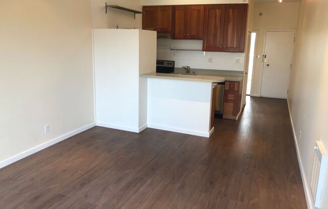 Top Floor Remodeled rent controlled apartment w/ parking, storage and water, garbage and laundry included.