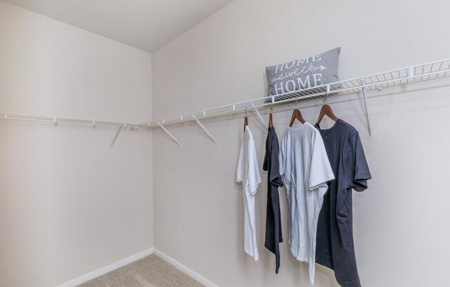 a man standing in front of a mirror posing for the camera