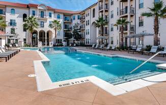 Resort style pool in center of community  at Two Addison Place Apartments , Pooler, Georgia