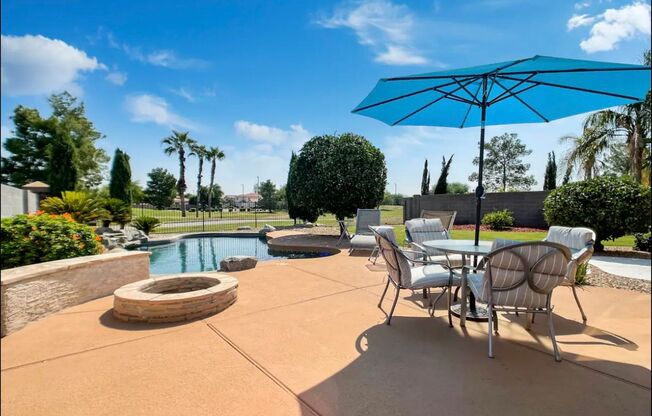 Gorgeous Furnished Single Level 3 Bedroom + 2 Bathroom + Den + 3 Car Garage + Pool + Golf Course Cul De Sac Lot in Greenfield Lakes in Gilbert